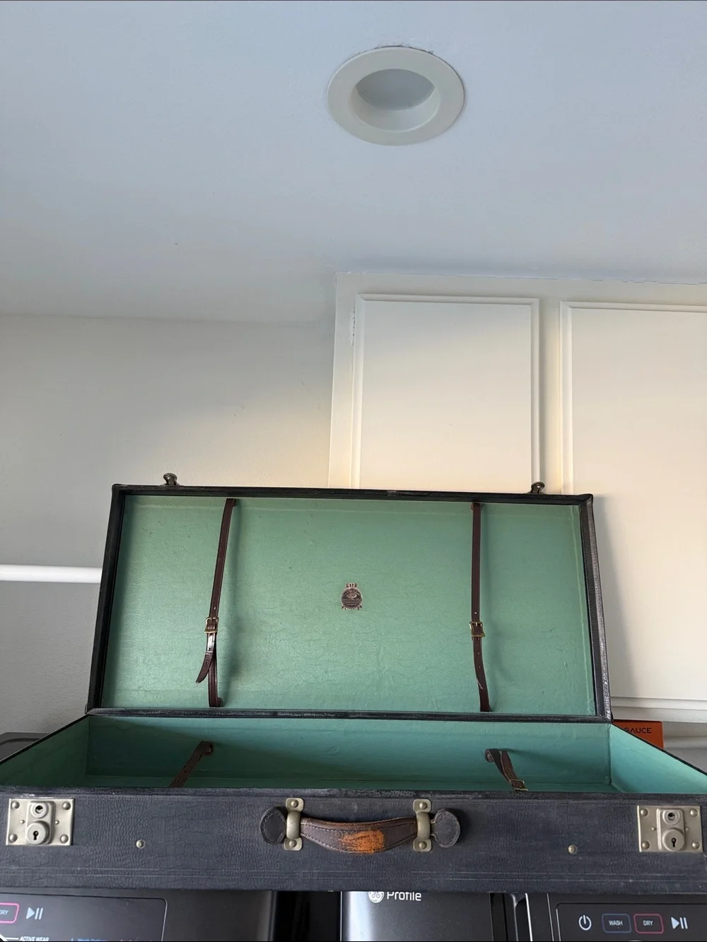 Classic Black Storage Trunk with Teal Interior - Versatile Home Organizer